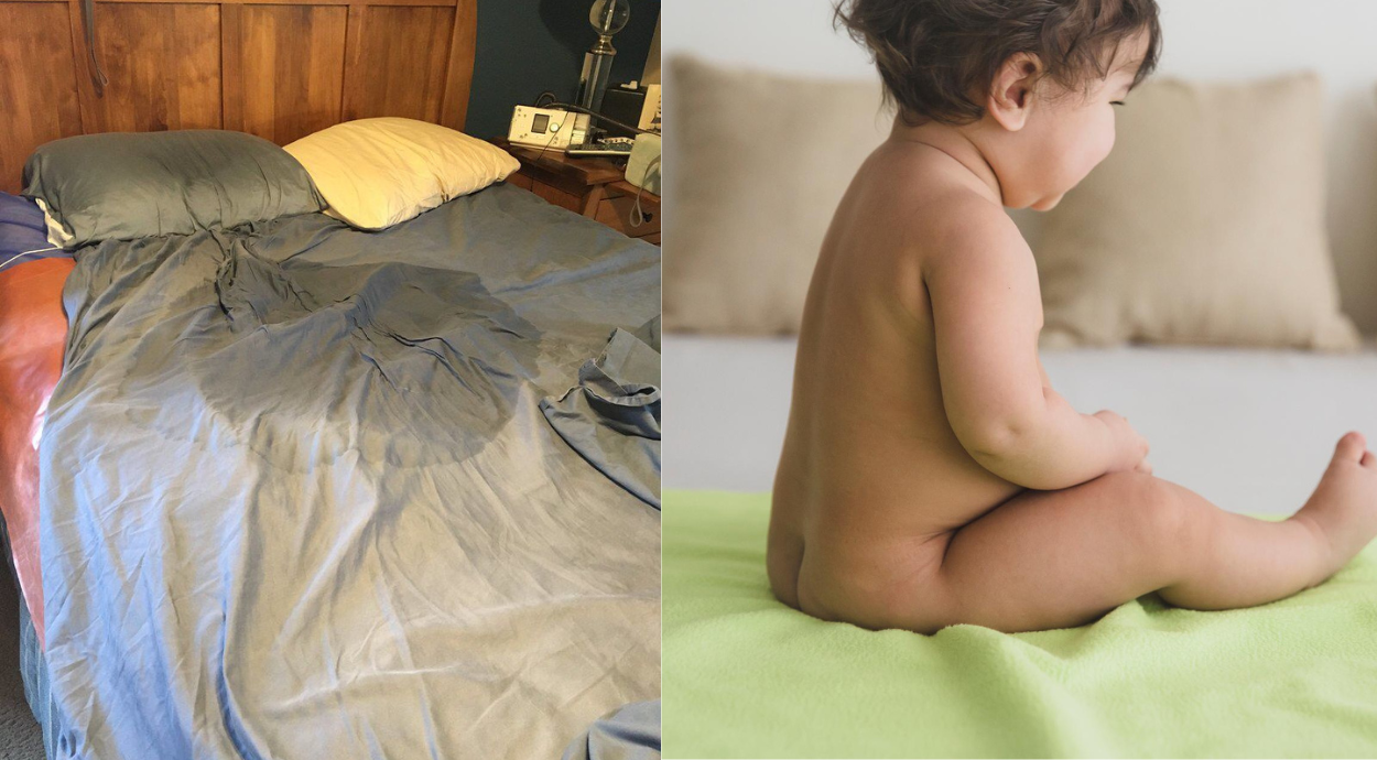 A rumpled bed with two pillows, showing a noticeable wet spot, alongside a seated, bare baby on a bright green blanket.