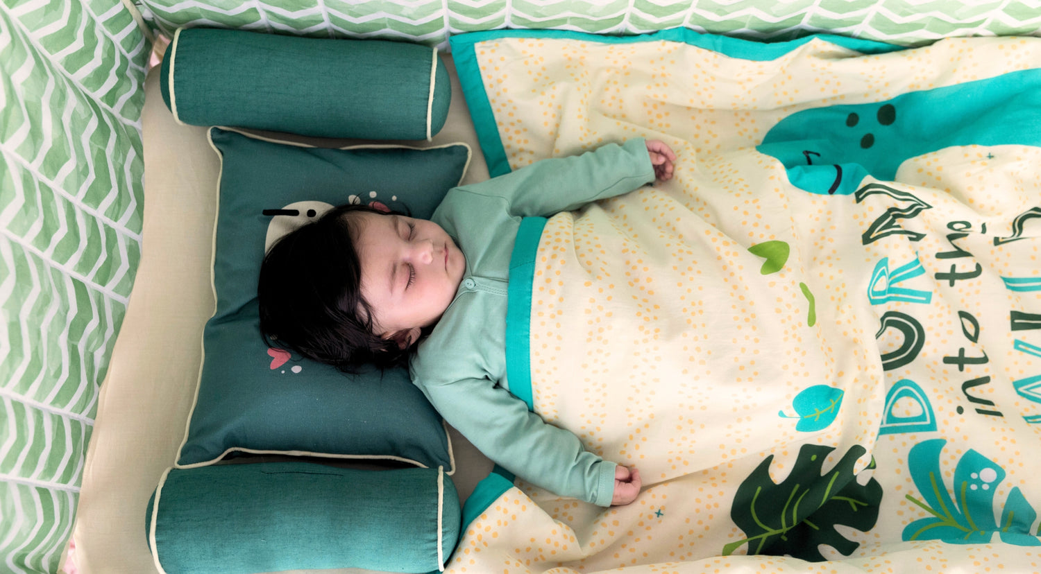 baby sleeping in blanket