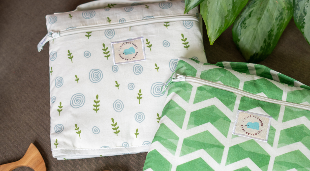 two changing mats in different color and pattern