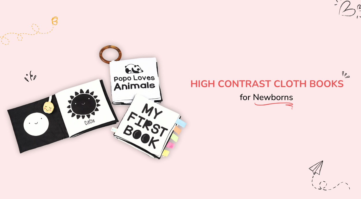 three high contrast book in black and white color on a pink background