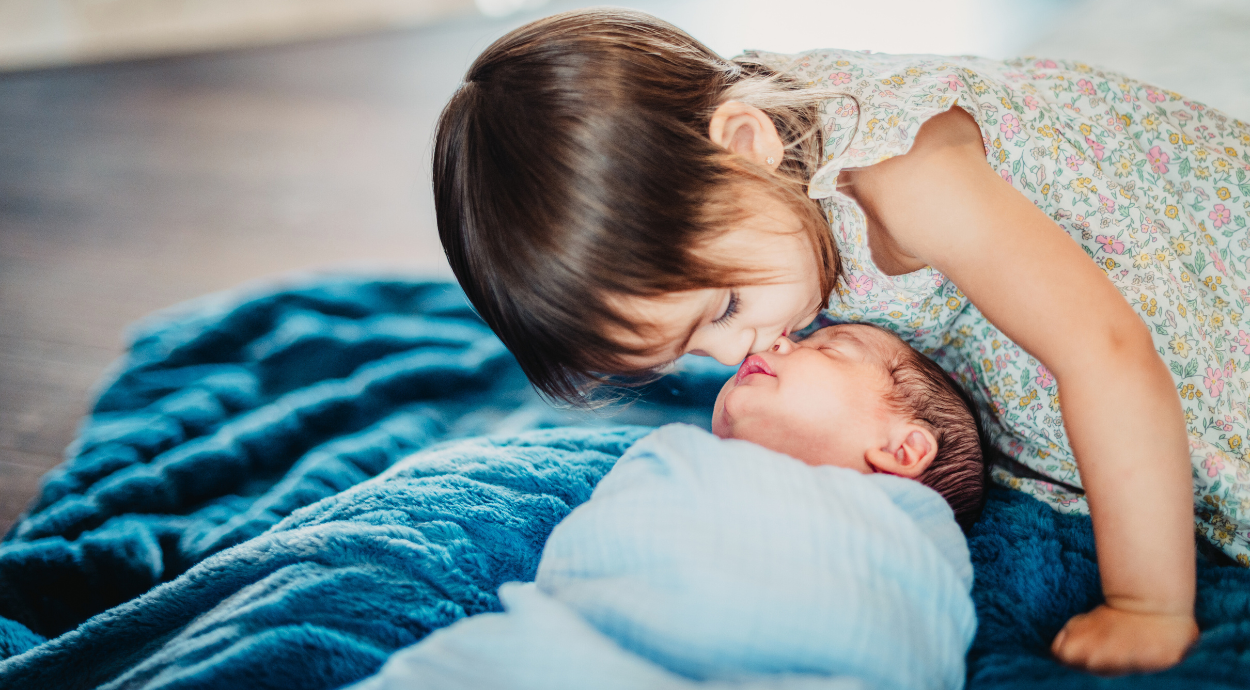 How to Prepare Older Siblings for a New Baby - Tidy Sleep