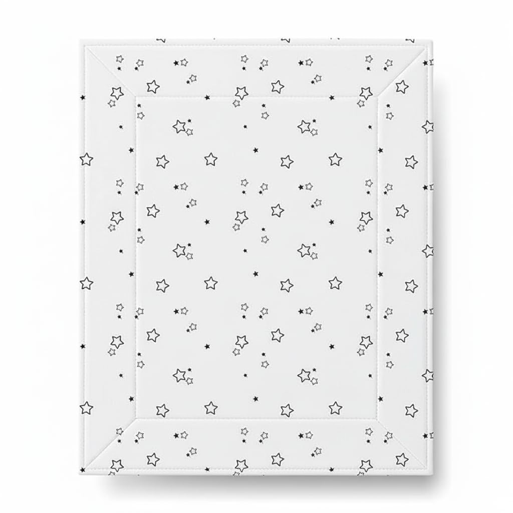 White background covered with various-sized black outlined stars and dots changing mat. The pattern is evenly distributed, creating a playful and whimsical feel.