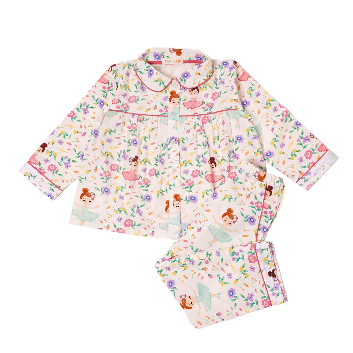 A set of girls' pajamas in white with a pattern of ballerinas and flowers.Includes a long-sleeved top with a button-down front and matching pants.
