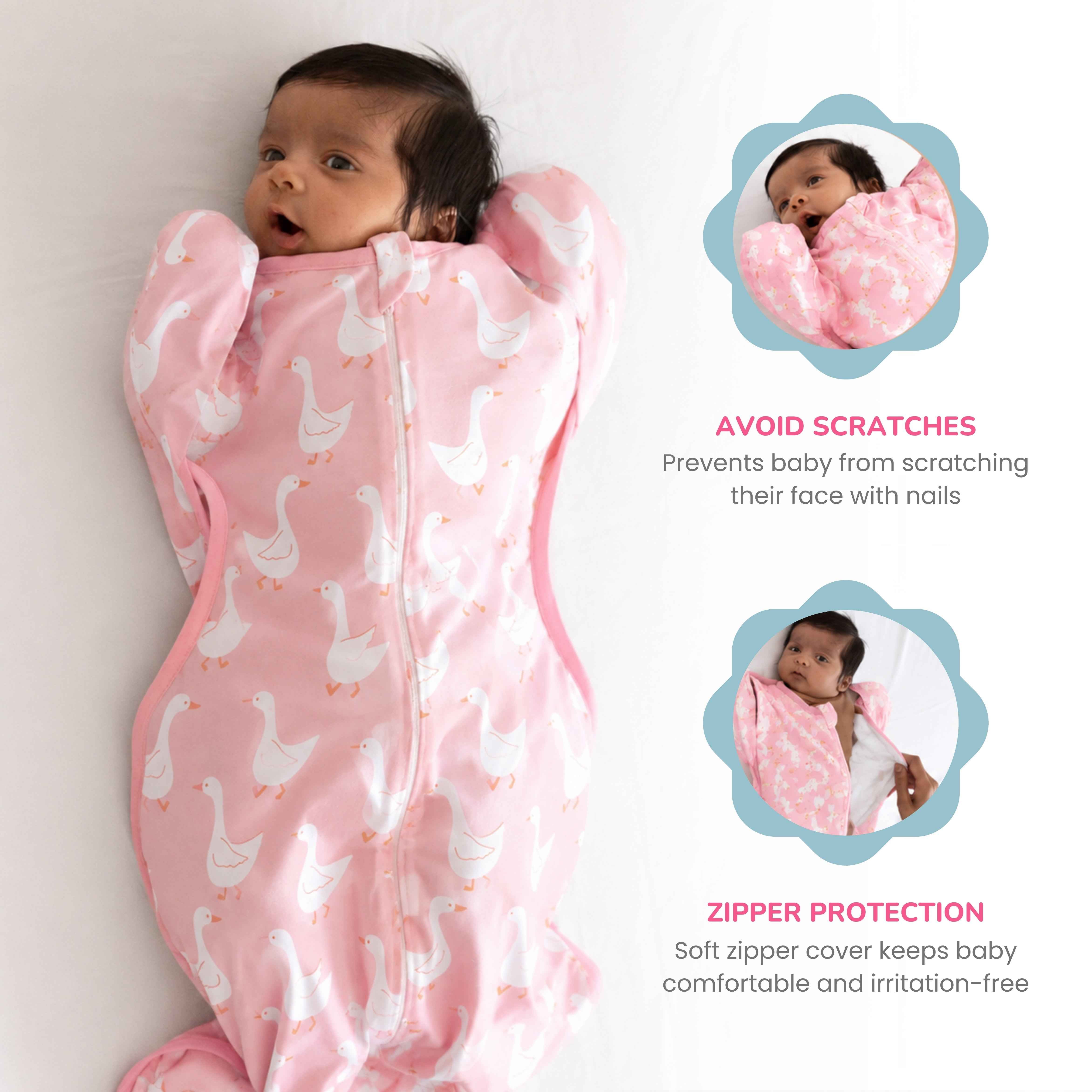 A baby swaddled in a Pink with white and yellow duck print arms-up cotton jersey swaddle with a zipper, shown on a white background with two inset photos demonstrating product features: a face-protecting zipper cover and a scratch-prevention design.