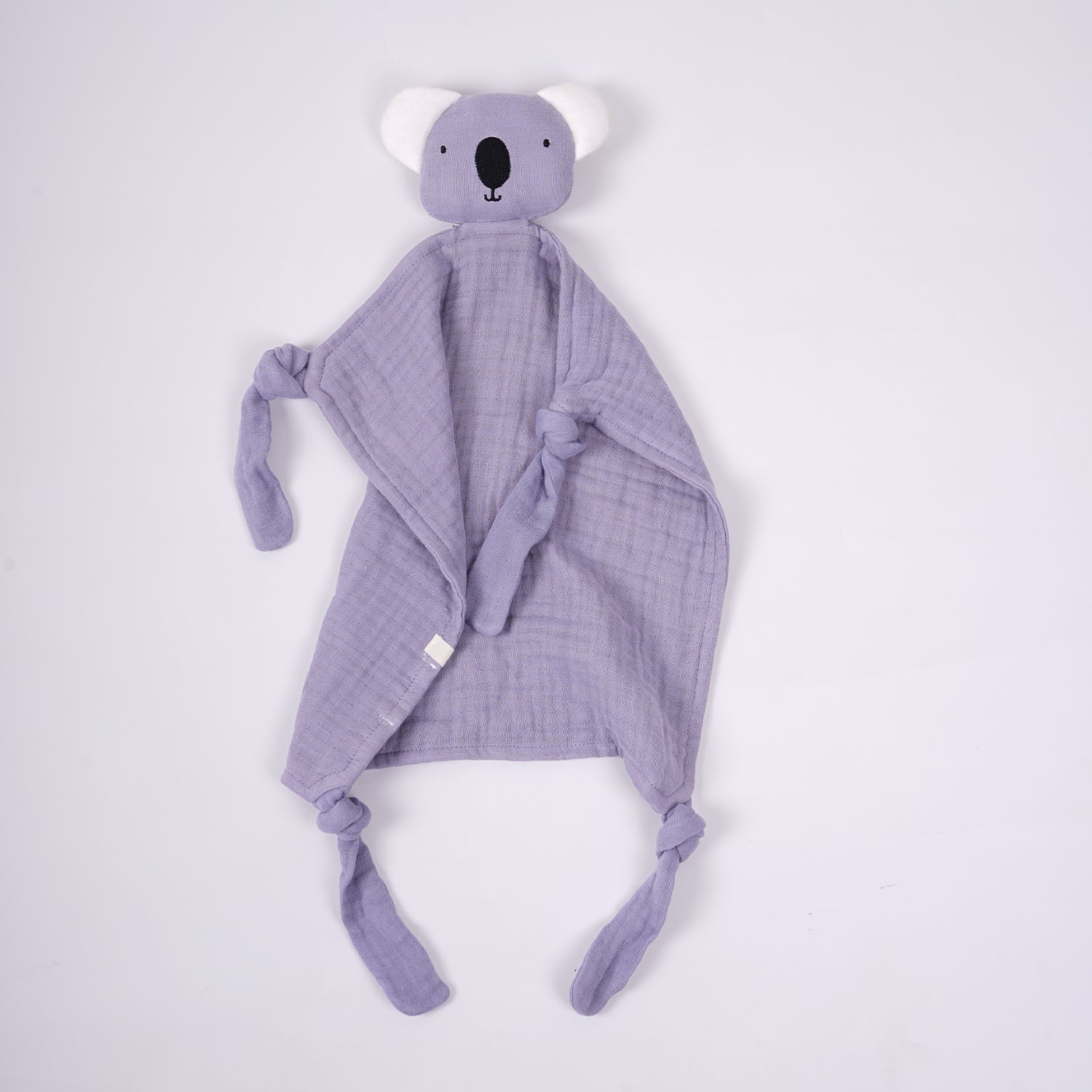 Light lavender face napkin with a cute koala head design and knotted corners, perfect for babies