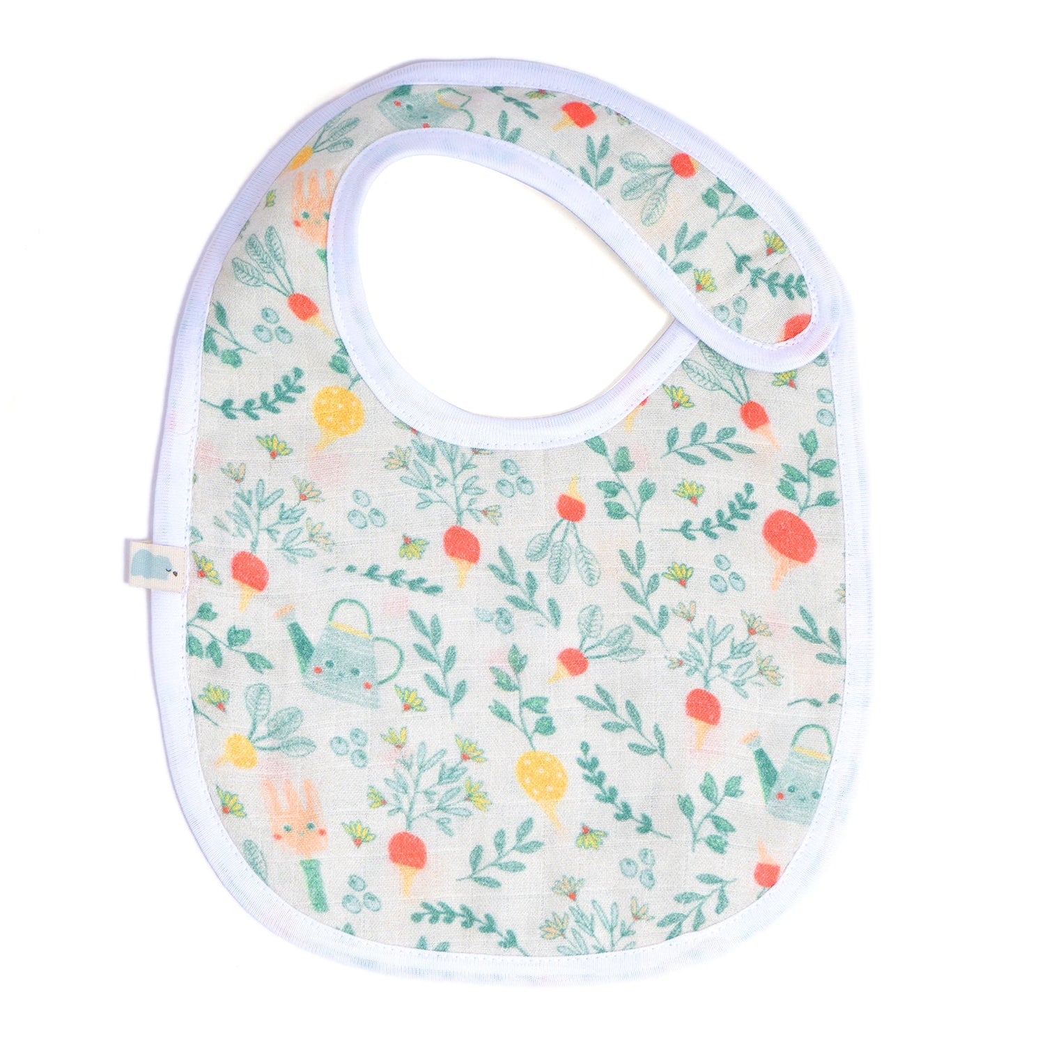 baby bib with a garden-themed print featuring plants, watering cans, and root vegetables on a soft beige background, edged with white trim