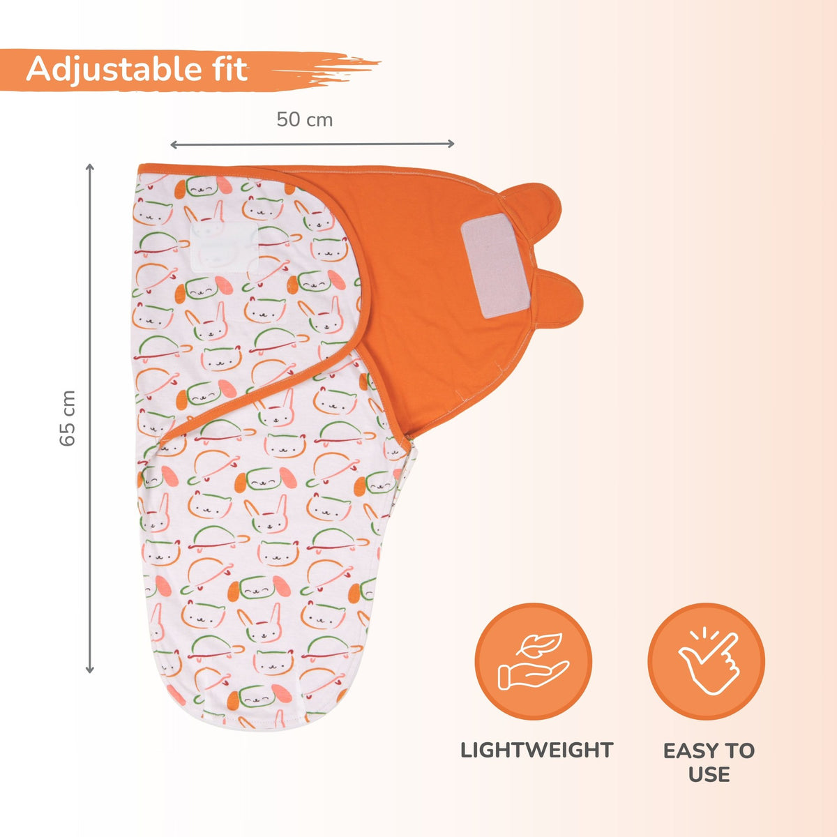 An adjustable baby swaddle wrap shown on a soft peach background with measurement lines indicating 65 cm height and 50 cm width. The swaddle has a white base with a colorful cartoon animal print and a solid orange hood.