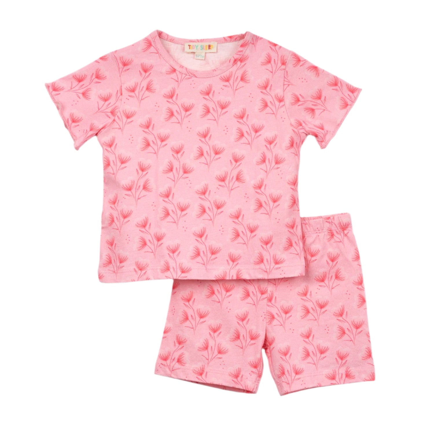 Light pink baby pajama set featuring a short-sleeve shirt and shorts, adorned with a delicate floral pattern.