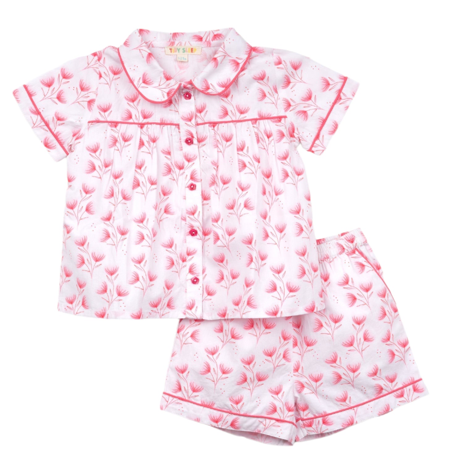 Cute pink and white floral baby pajama set featuring a collared short-sleeve top and matching shorts with an elastic waistband.