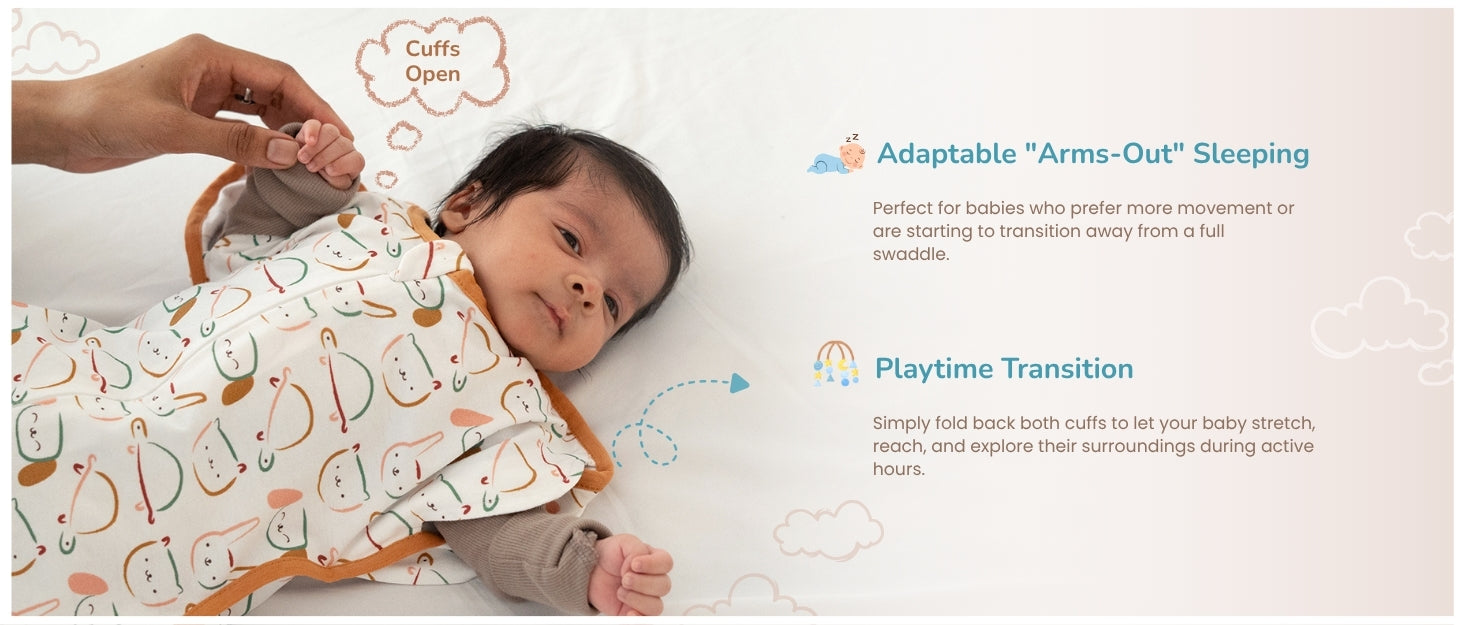 Baby in a patterned swaddle with cuffs open, showing adaptable "arms-out" sleeping and playtime transition for more movement.