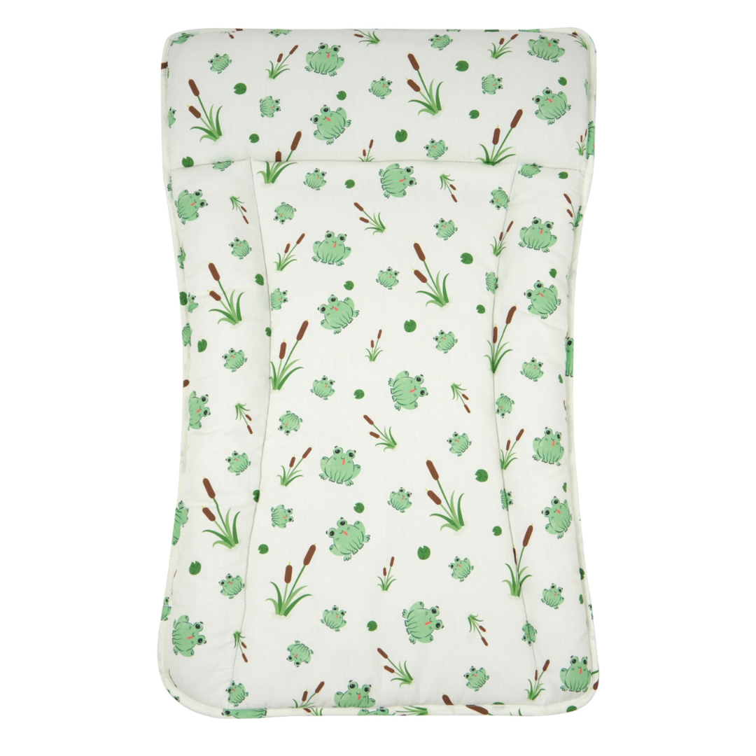 A rectangular baby changing station cover featuring a green frog and reed pattern on a warm off-white background, shown flat against a white studio background.