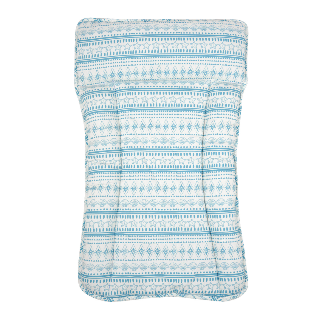A rectangular baby changing station with a light blue and white geometric pattern, shown flat against a white background.
