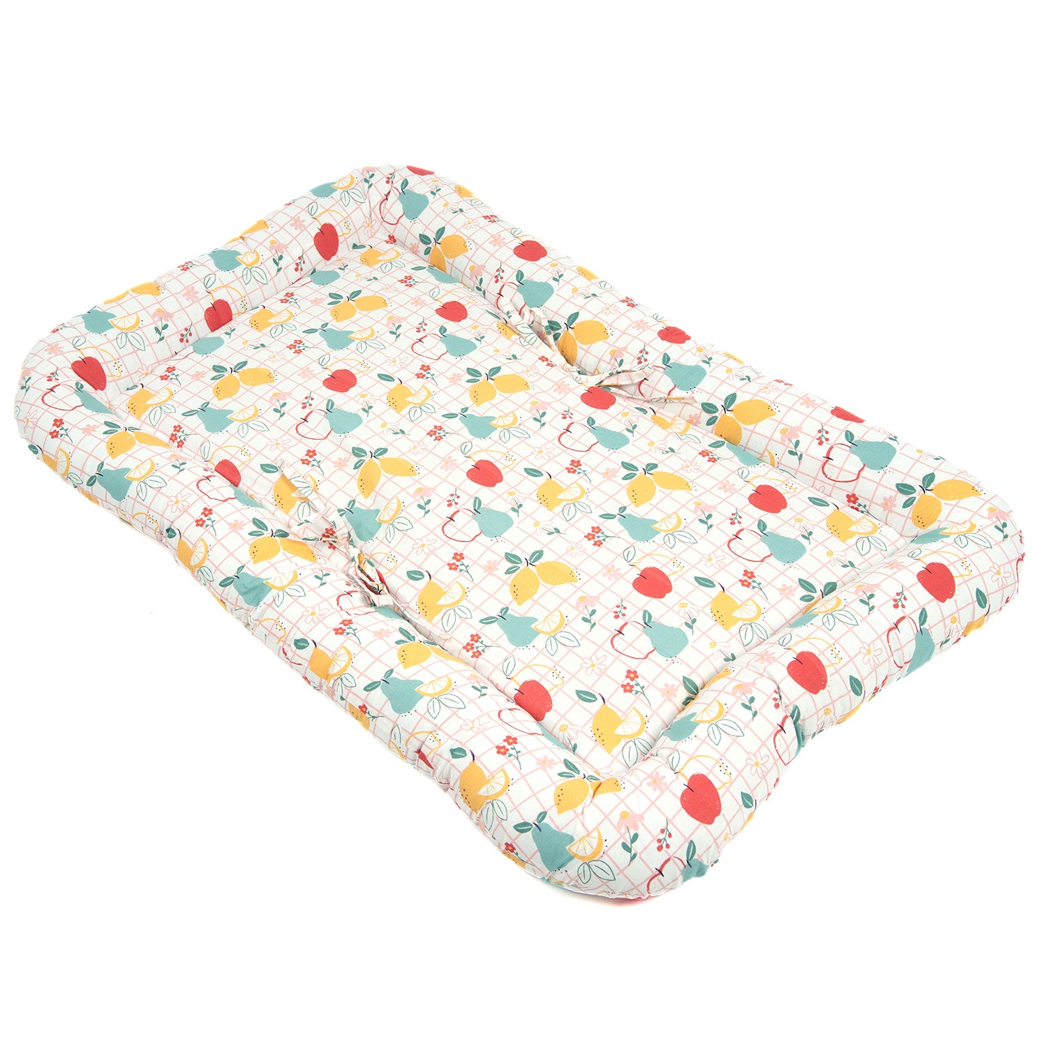 Tilted view of a Baby Gadda Set with a colorful fruit pattern, featuring apples, pears, and lemons on a grid background. Soft and padded design.