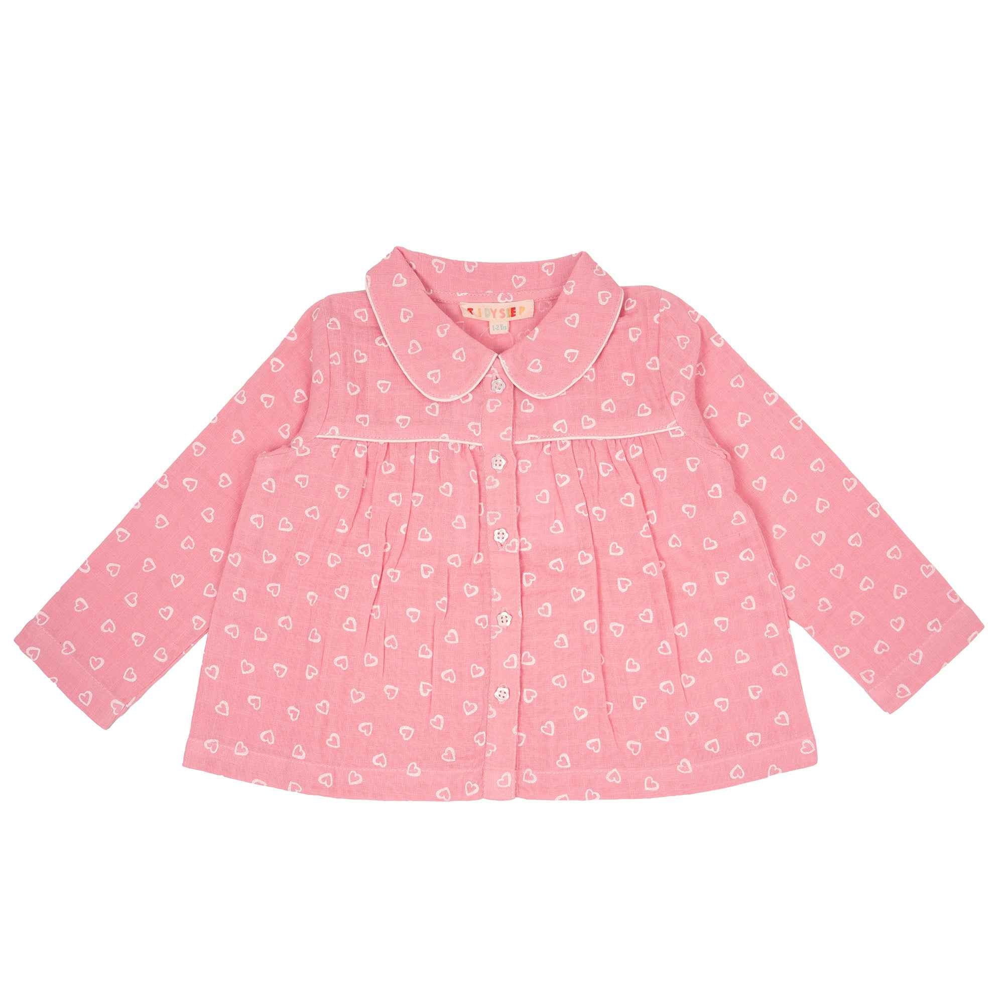 Baby girl pink long-sleeve button-up top , decorated with mini white heart patterns.