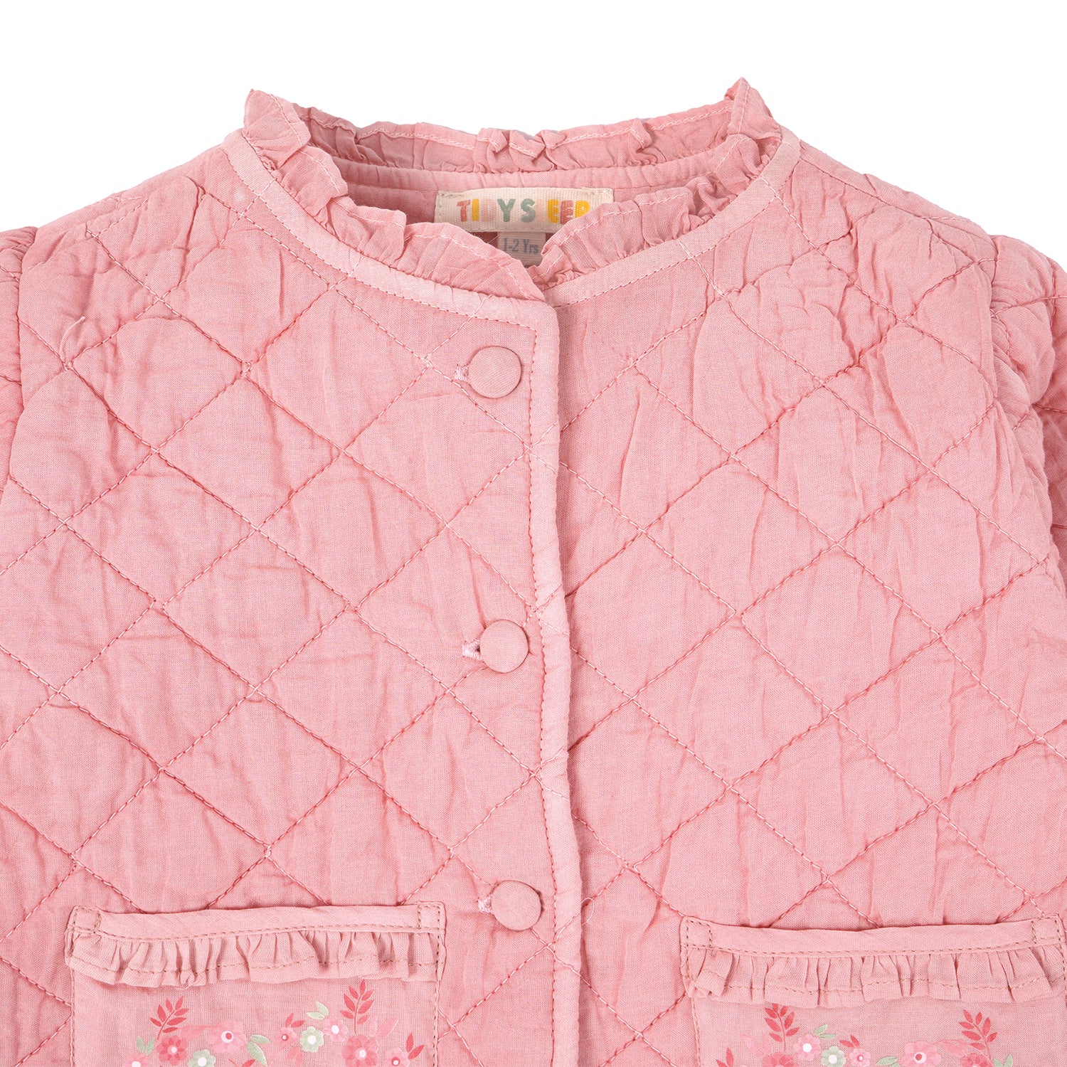 Pink quilted jacket with floral patterns on a white background