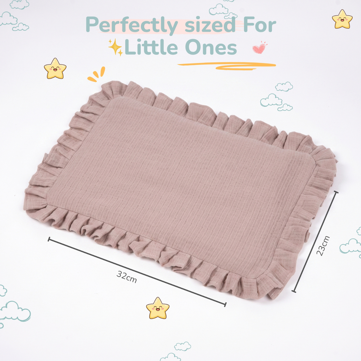 A rectangular baby mustard seed pillow in rose tan color with a ruffled edge, shown with dimension lines indicating 32cm by 23cm. The image includes decorative cartoon stars, clouds, and the text 'Perfectly sized For Little Ones'.