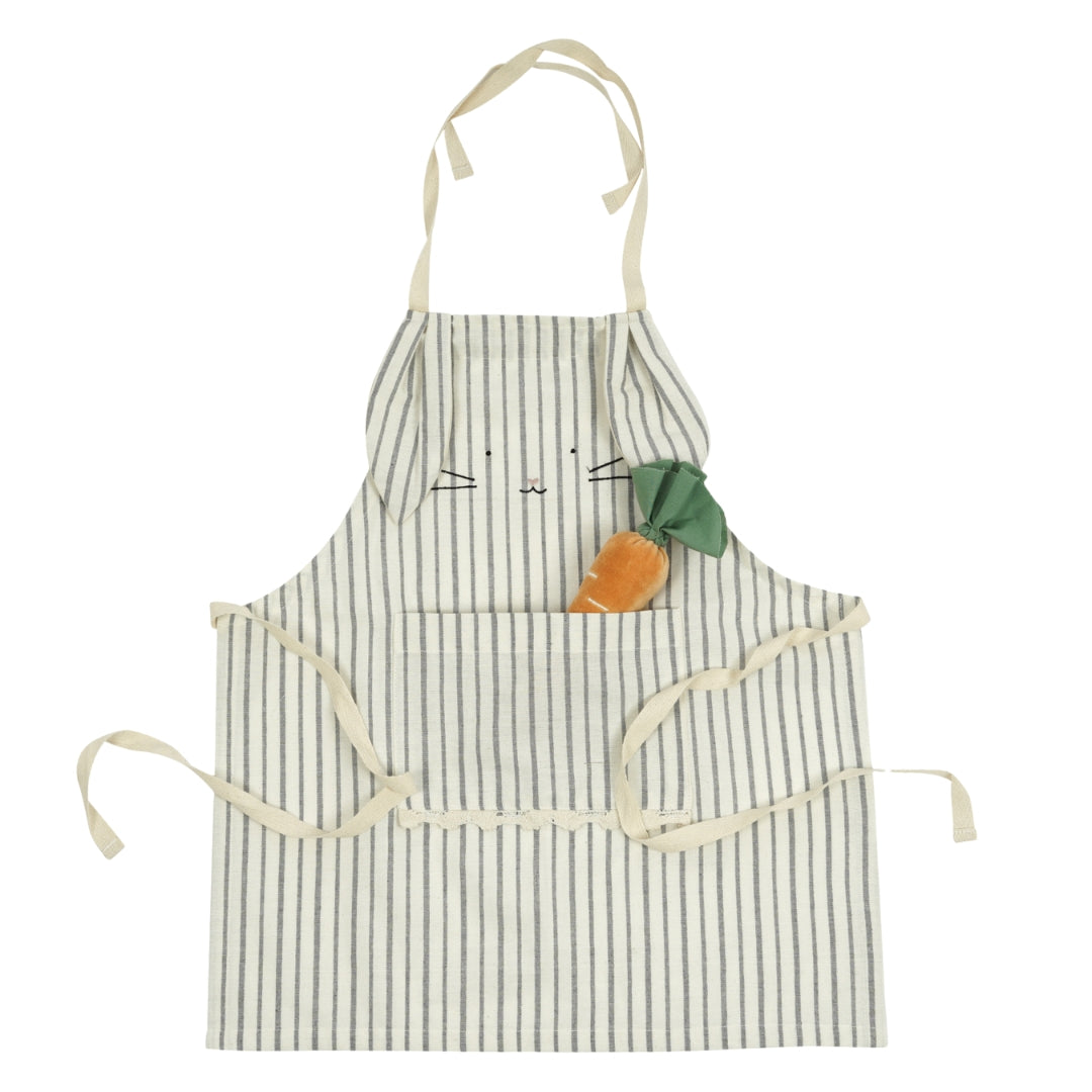 Grey striped children's apron resembling a rabbit, with a carrot pocket detail and bunny ears, perfect for playful cooking.