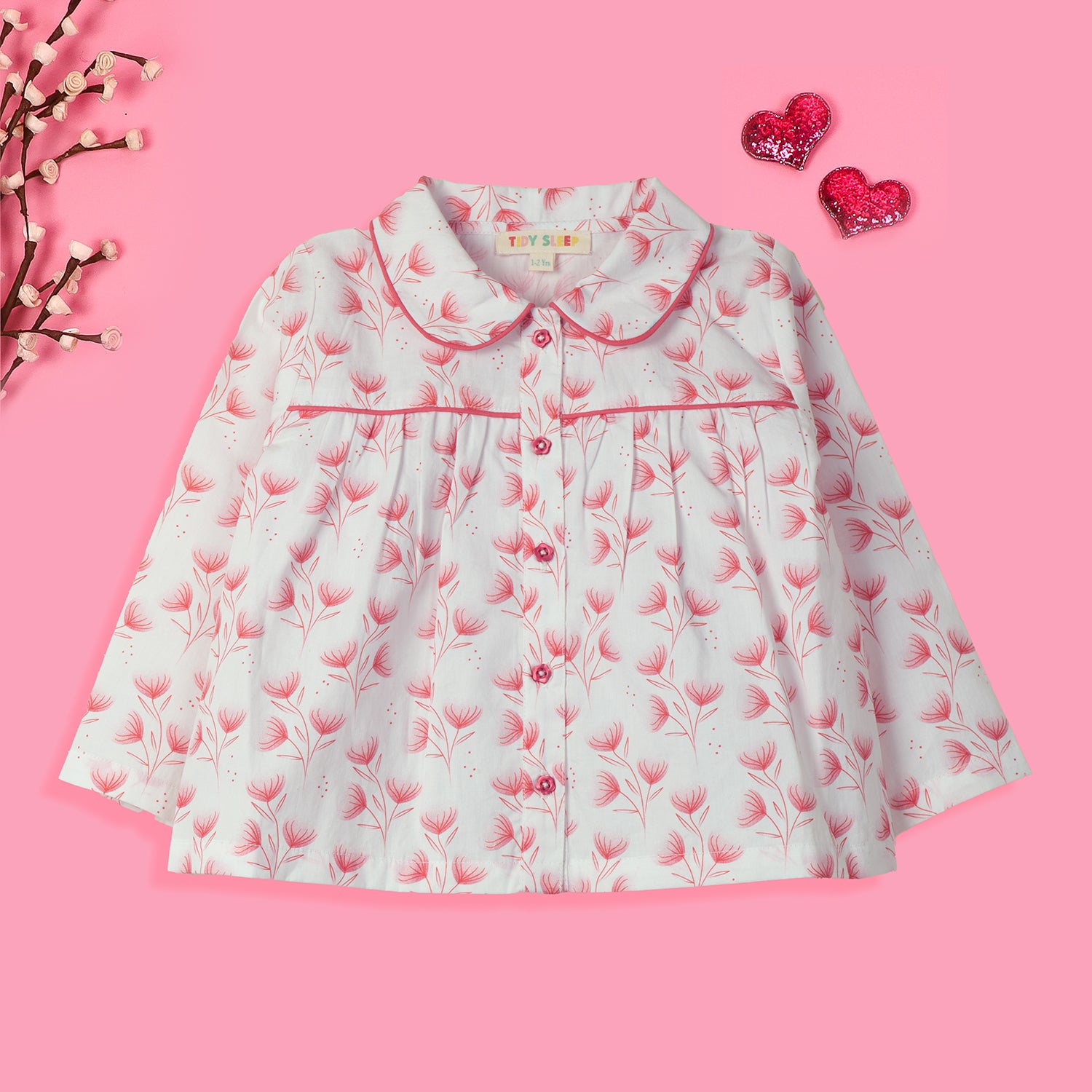 Floral-patterned baby night suit set featuring a button-up top