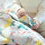 Tidy Sleep Baby Quilt (0-2 Years) - Fruit Print White